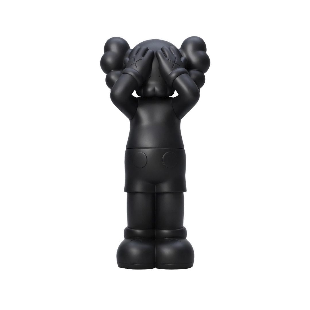 Фото 1: Kaws — KAWS Holiday UK Vinyl Figure Black — доступно в POGO Фото 1: Kaws — KAWS Holiday UK Vinyl Figure Black — доставка рідкісних товарів з-за кордону
